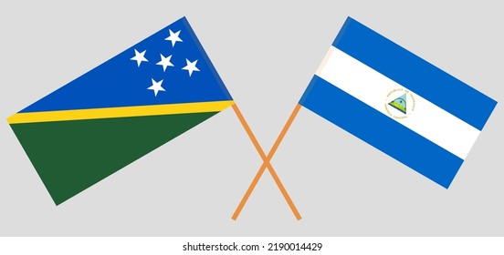 Crossed flags of Solomon Islands and Nicaragua. Official colors. Correct proportion. Vector illustration
