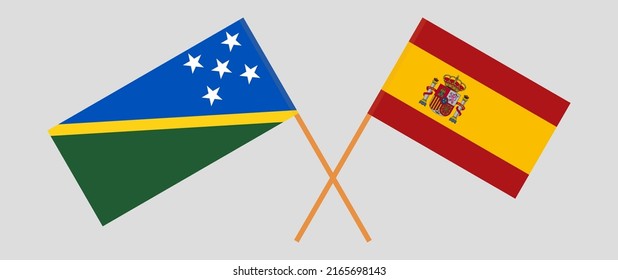 Crossed flags of Solomon Islands and Spain. Official colors. Correct proportion. Vector illustration
