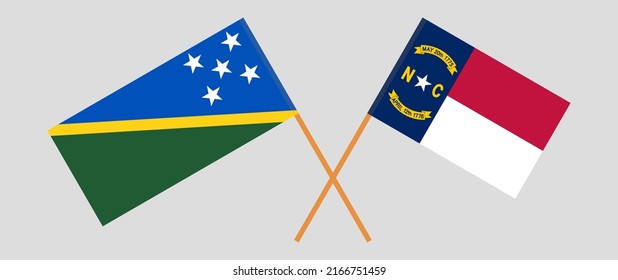 Crossed flags of Solomon Islands and The State of North Carolina. Official colors. Correct proportion. Vector illustration
