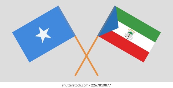 Crossed flags of Somalia and Equatorial Guinea. Official colors. Correct proportion. Vector illustration
