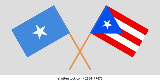 Crossed flags of Somalia and Puerto Rico. Official colors. Correct proportion. Vector illustration
