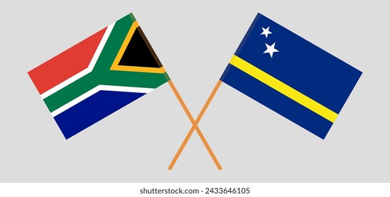 Crossed flags of South Africa and Country of Curacao. Official colors. Correct proportion. Vector illustration
