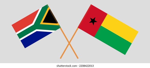 Crossed flags of South Africa and Guinea-Bissau. Official colors. Correct proportion. Vector illustration
