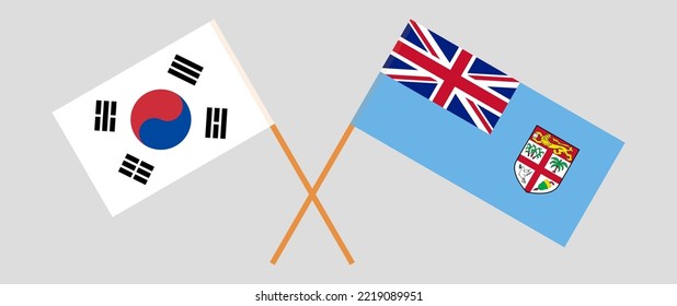 Crossed flags of South Korea and Fiji. Official colors. Correct proportion. Vector illustration
