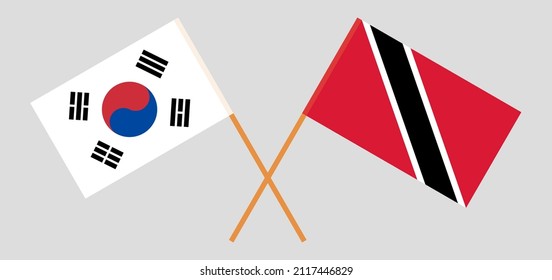 Crossed flags of South Korea and Trinidad and Tobago. Official colors. Correct proportion. Vector illustration
