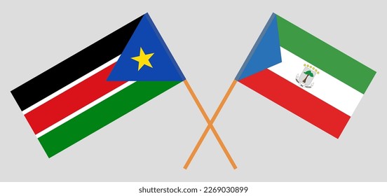 Gekreuzte Flaggen von Südsudan und Äquatorialguinea. Offizielle Farben. Richtiger Anteil. Vektorgrafik