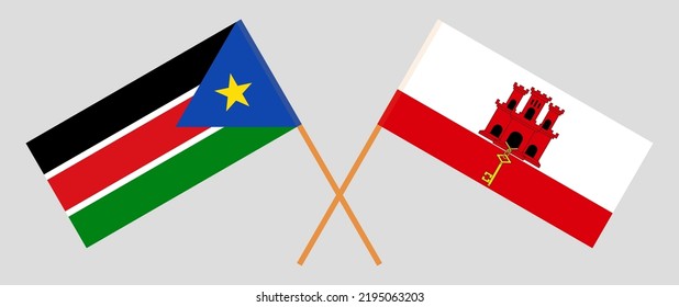 Crossed flags of South Sudan and Gibraltar. Official colors. Correct proportion. Vector illustration
