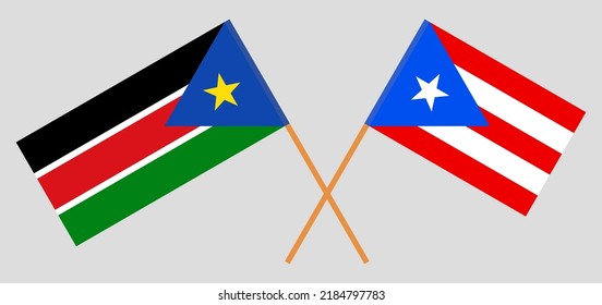 Crossed flags of South Sudan and Puerto Rico. Official colors. Correct proportion. Vector illustration
