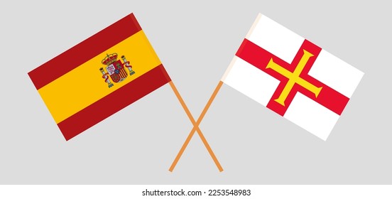Crossed flags of Spain and Bailiwick of Guernsey. Official colors. Correct proportion