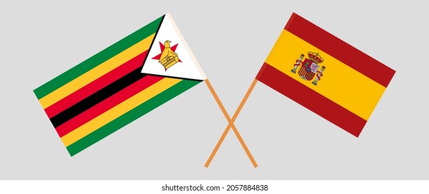 Crossed flags of Spain and the Republic of Zimbabwe. Official colors. Correct proportion