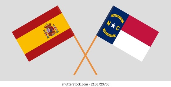 Crossed flags of Spain and The State of North Carolina. Official colors. Correct proportion. Vector illustration
