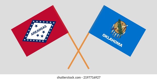 Crossed flags of The State of Arkansas and The State of Oklahoma. Official colors. Correct proportion. Vector illustration

