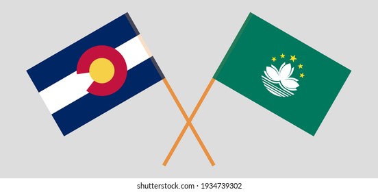 Crossed flags of The State of Colorado and Macau. Official colors. Correct proportion