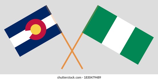 Crossed flags of The State of Colorado and Nigeria
