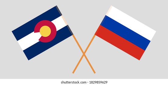 Crossed flags of The State of Colorado and Russia