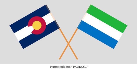 Crossed flags of The State of Colorado and Sierra Leone. Official colors. Correct proportion