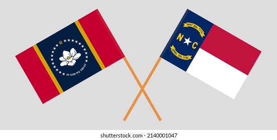 Crossed flags of The State of Mississippi and The State of North Carolina. Official colors. Correct proportion. Vector illustration
