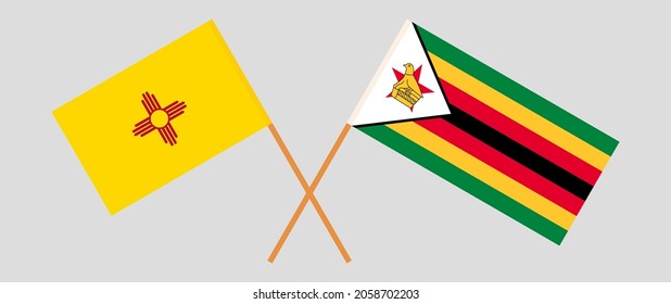 Crossed flags of the State of New Mexico and the Republic of Zimbabwe. Official colors. Correct proportion
