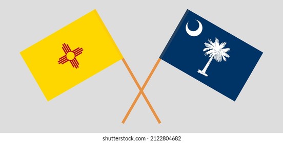 Crossed flags of the State of New Mexico and The State of South Carolina. Official colors. Correct proportion. Vector illustration
