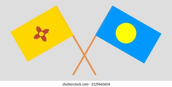 Crossed flags of the State of New Mexico and Palau. Official colors. Correct proportion. Vector illustration