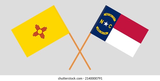 Crossed flags of the State of New Mexico and The State of North Carolina. Official colors. Correct proportion. Vector illustration
