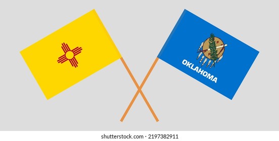 Crossed flags of the State of New Mexico and The State of Oklahoma. Official colors. Correct proportion. Vector illustration
