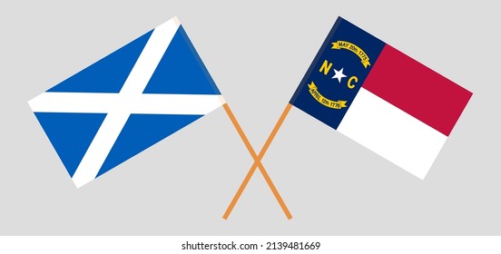 Crossed flags of The State of North Carolina and Scotland. Official colors. Correct proportion. Vector illustration
