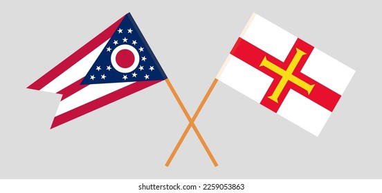 Crossed flags of the State of Ohio and Bailiwick of Guernsey. Official colors. Correct proportion. Vector illustration
