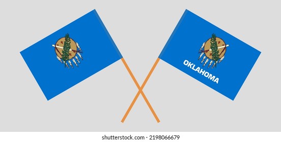 Crossed flags of The State of Oklahoma. Official colors. Correct proportion. Vector illustration
