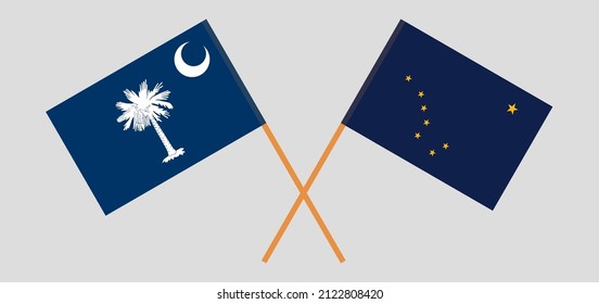Crossed flags of The State of South Carolina and the State of Alaska. Official colors. Correct proportion. Vector illustration
