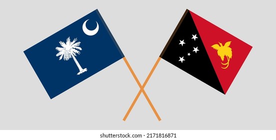 Crossed flags of The State of South Carolina and Papua New Guinea. Official colors. Correct proportion. Vector illustration
