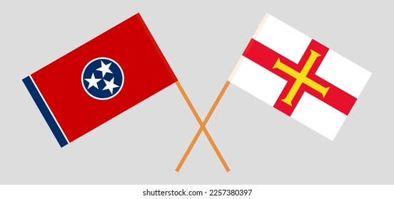 Crossed flags of The State of Tennessee and Bailiwick of Guernsey. Official colors. Correct proportion. Vector illustration
