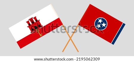 Crossed flags of The State of Tennessee and Gibraltar. Official colors. Correct proportion. Vector illustration
