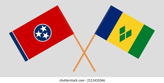 Crossed flags of The State of Tennessee and Saint Vincent and the Grenadines. Official colors. Correct proportion. Vector illustration
