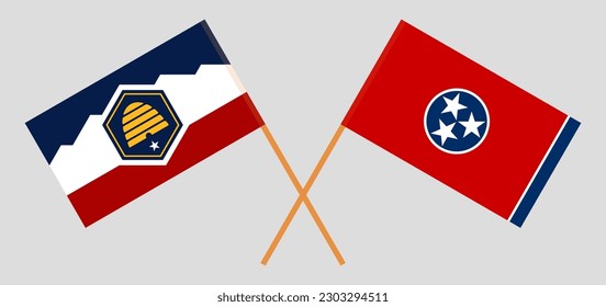 Crossed flags of The State of Utah and The State of Tennessee. Official colors. Correct proportion. Vector illustration
