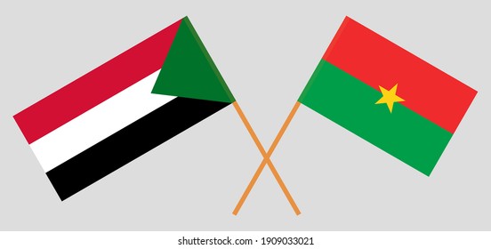 Crossed flags of the Sudan and Burkina Faso