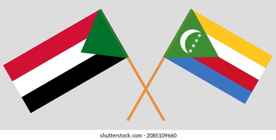 Crossed flags of the Sudan and the Comoros. Official colors. Correct proportion. Vector illustration
