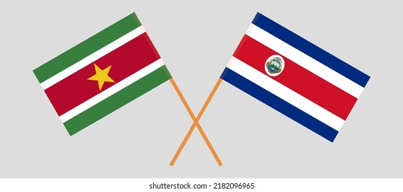 Crossed flags of Suriname and Costa Rica. Official colors. Correct proportion. Vector illustration
