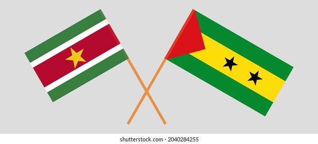 Crossed flags of Suriname and Sao Tome and Principe. Official colors. Correct proportion