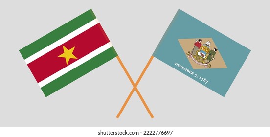 Crossed flags of Suriname and The State of Delaware. Official colors. Correct proportion. Vector illustration
