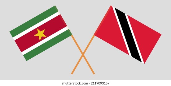 Crossed flags of Suriname and Trinidad and Tobago. Official colors. Correct proportion. Vector illustration
