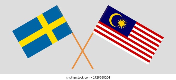 Crossed flags of Sweden and Malaysia. Official colors. Correct proportion
