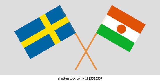 Banderas cruzadas de Suecia y Níger
