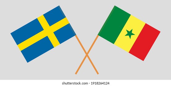 Crossed flags of Sweden and Senegal
