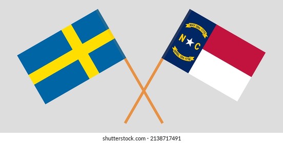 Crossed flags of Sweden and The State of North Carolina. Official colors. Correct proportion. Vector illustration
