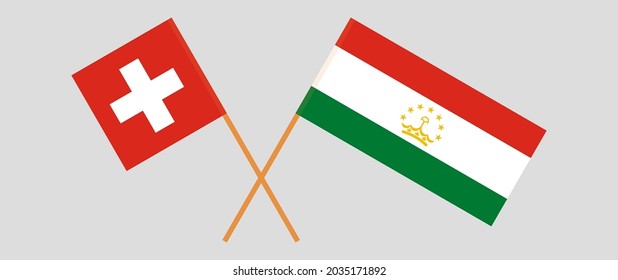 Crossed flags of Switzerland and Tajikistan. Official colors. Correct proportion