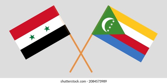 Crossed flags of Syria and the Comoros. Official colors. Correct proportion. Vector illustration
