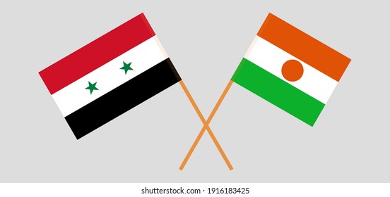 Crossed flags of Syria and the Niger