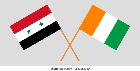 Crossed flags of Syria and Republic of Ivory Coast