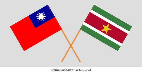 Crossed flags of Taiwan and Suriname. Official colors. Correct proportion
